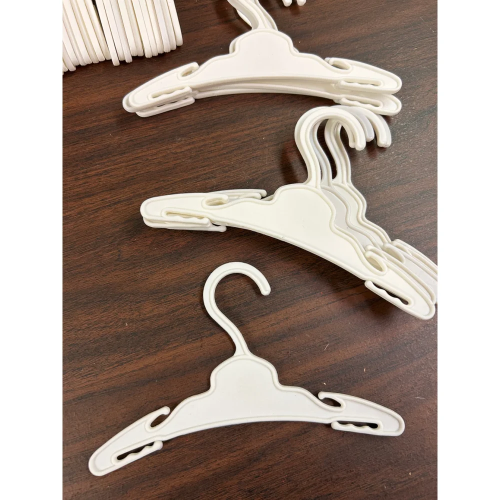 White Plastic Doll Hangers - Set of 10